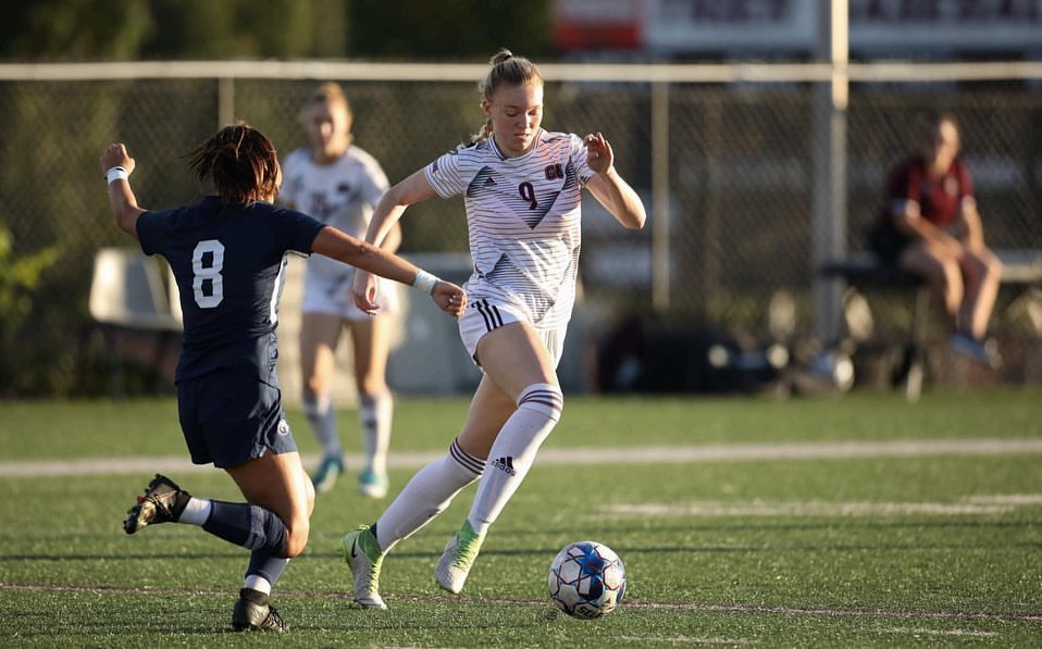 Jessie Bryson playing soccer