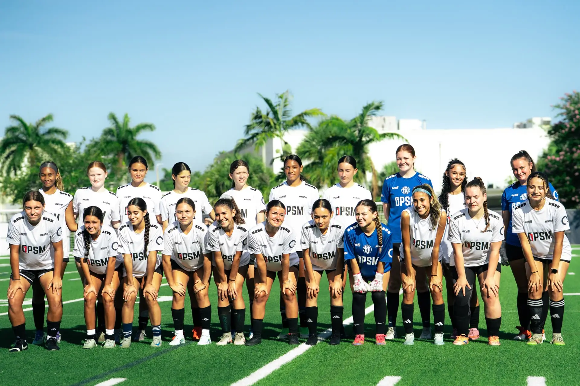 Girls squad team photo in white kits at NSU Florida