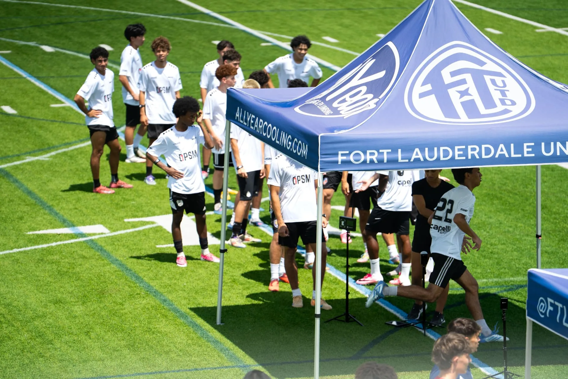 Players waiting their turn at the sprint testing station