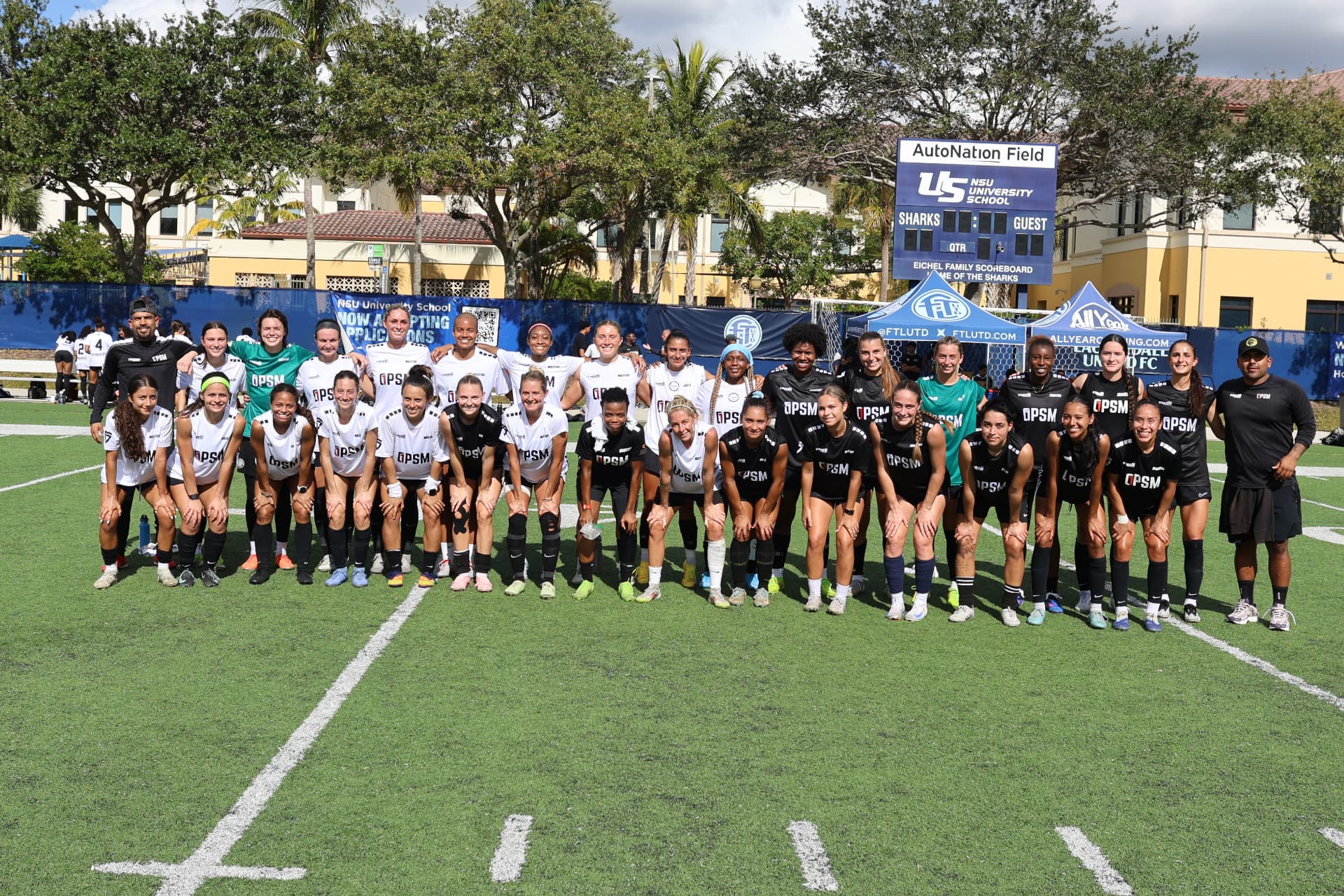 Full combine group photo of both squads at AutoNation Field